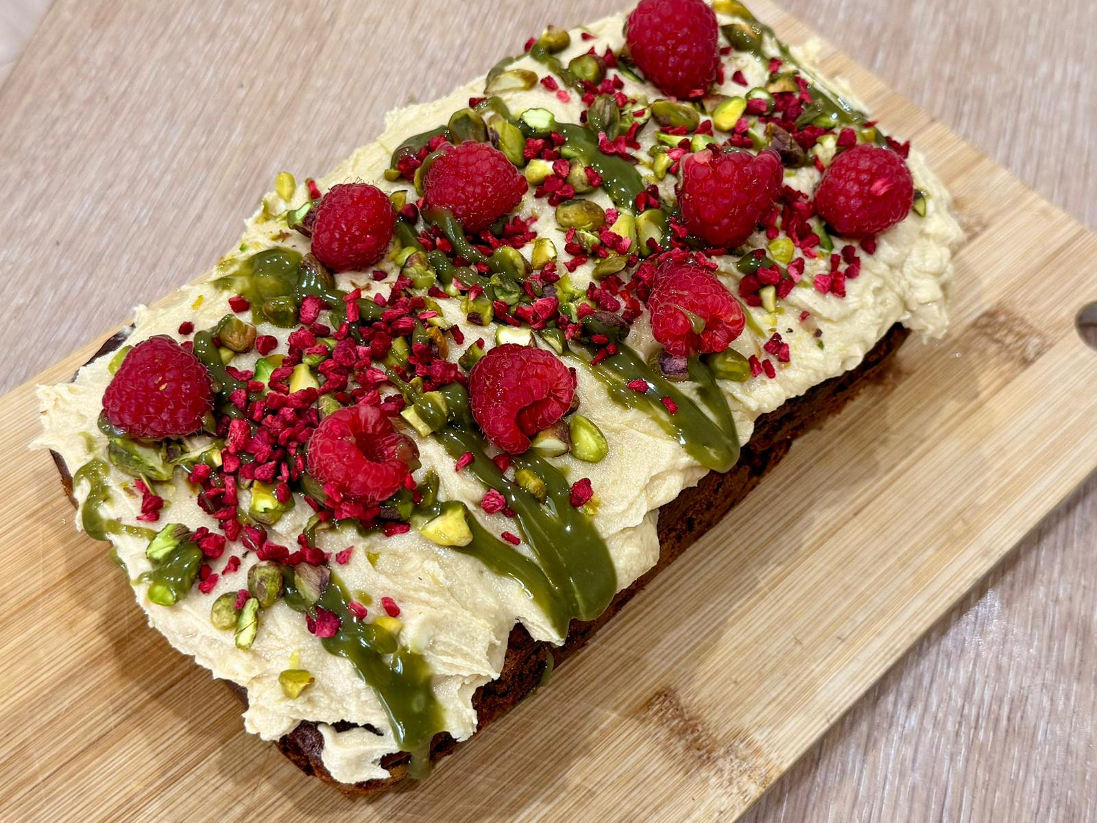 White chocolate, pistachio & raspberry loaf cake